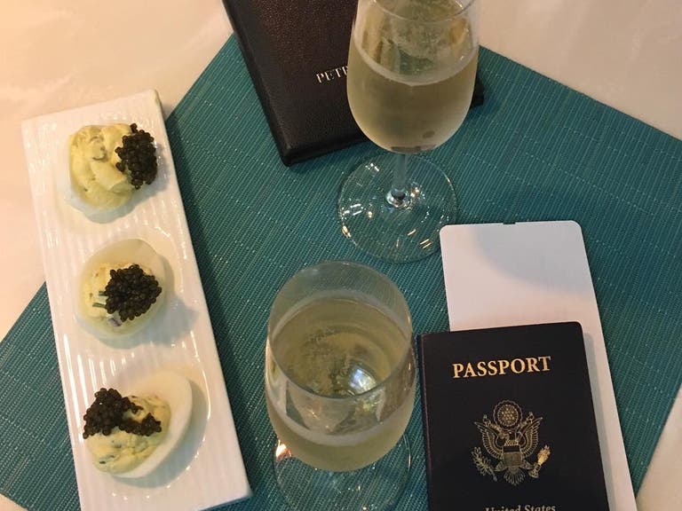 Caviar deviled eggs and bubbly at Petrossian LAX Tom Bradley International Terminal | Photo: @rs__120, Instagram